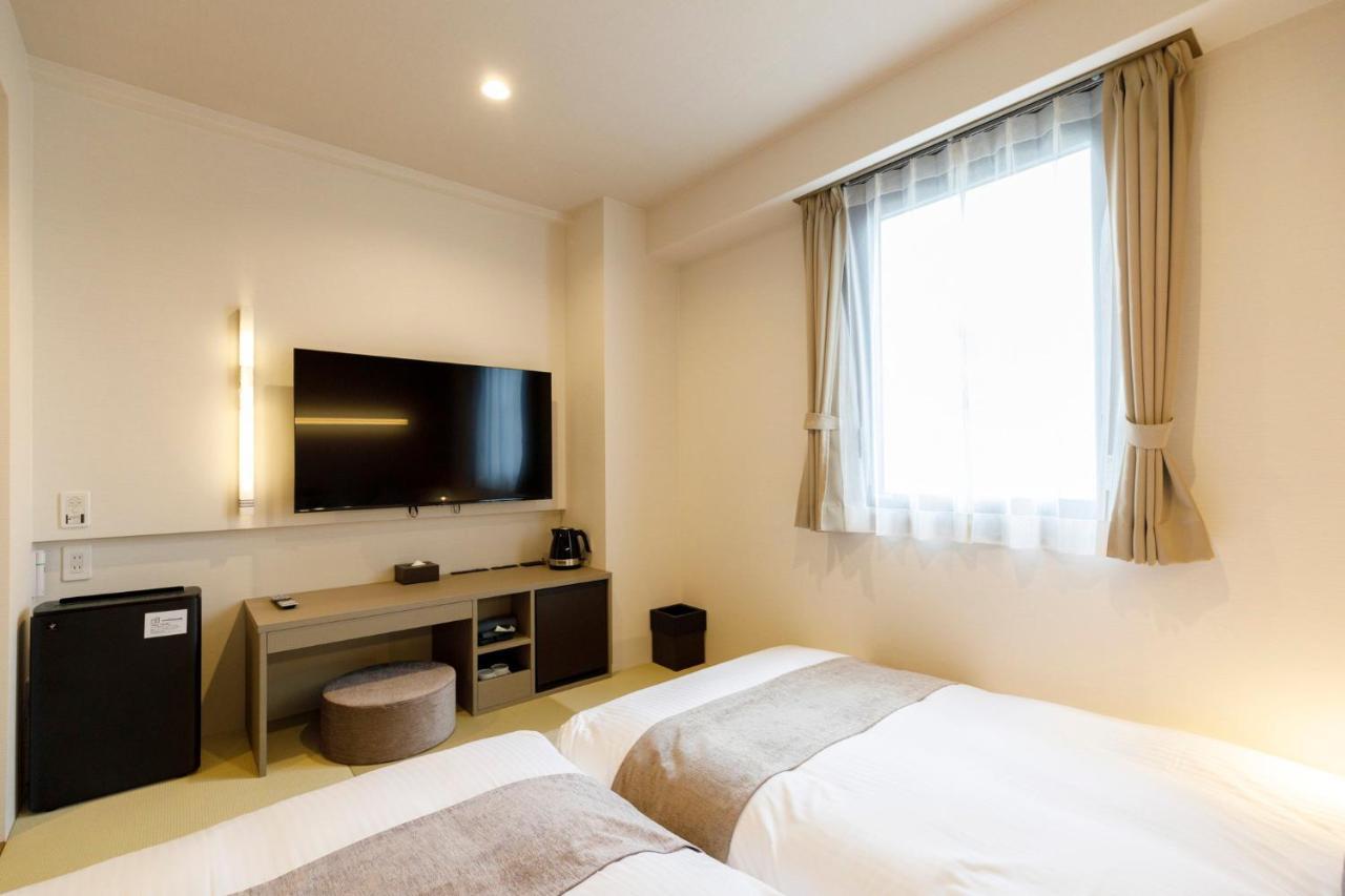 Hotel Third Place Hakata Fukuoka  Bagian luar foto